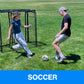 two people playing soccer in front of a portable soccer net.